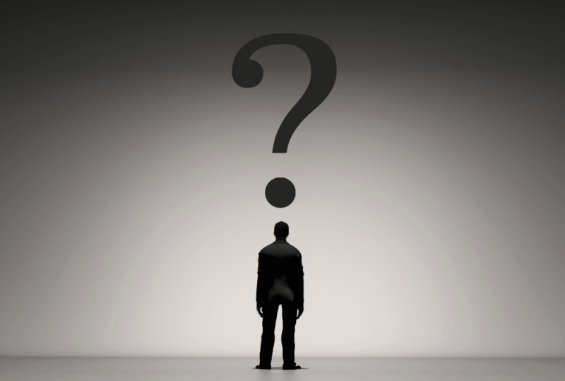Image is of a silhouette of a man with a large question mark above his head, concept of what shows up on background checks in Washington